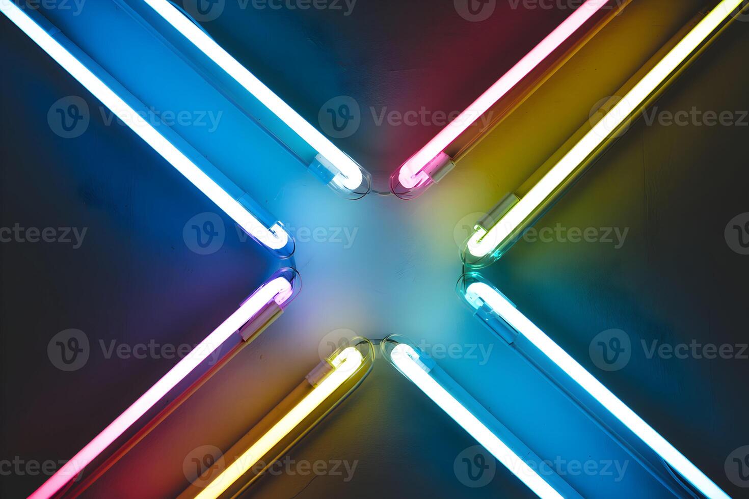 Neon colored tubes glow against a dark background, creating energetic ambiance photo