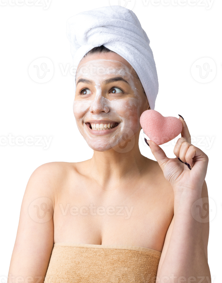 Beauty portrait of woman in white towel on head with a sponge for a body in view of a pink heart. png