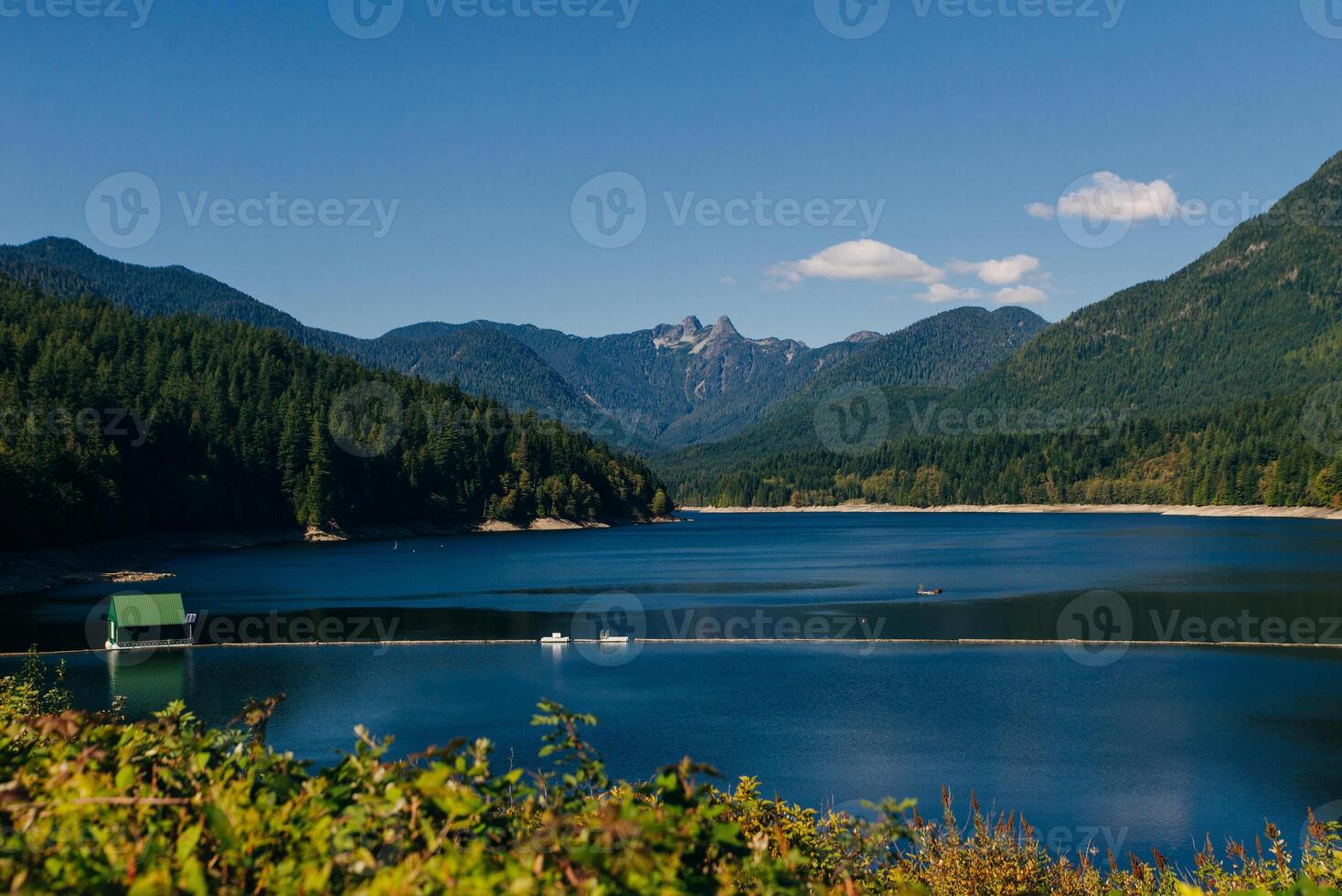 Capilano River and the lions mountain at sunset photo
