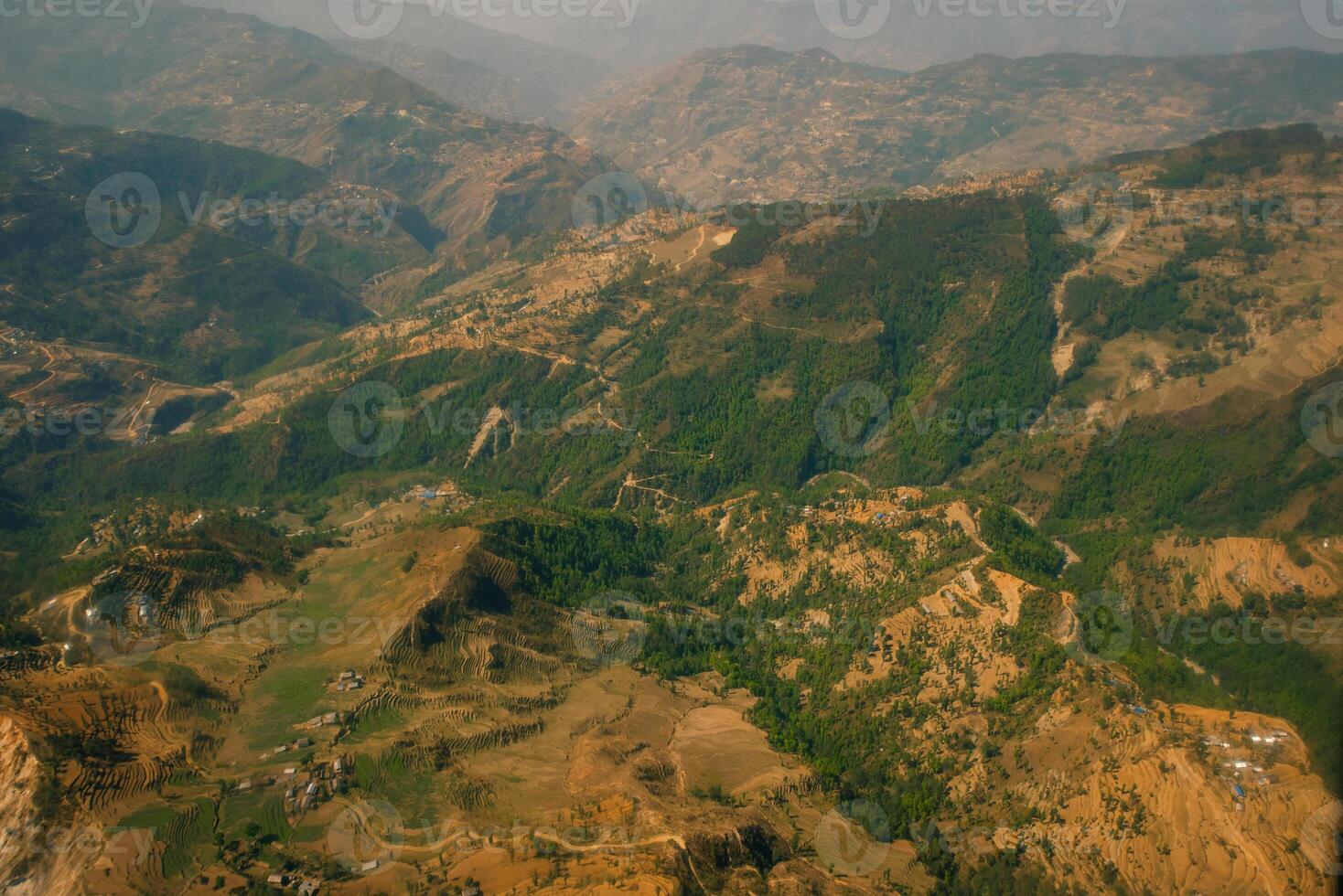 Aerial view of green and colorful rice field terraces, Nepal photo