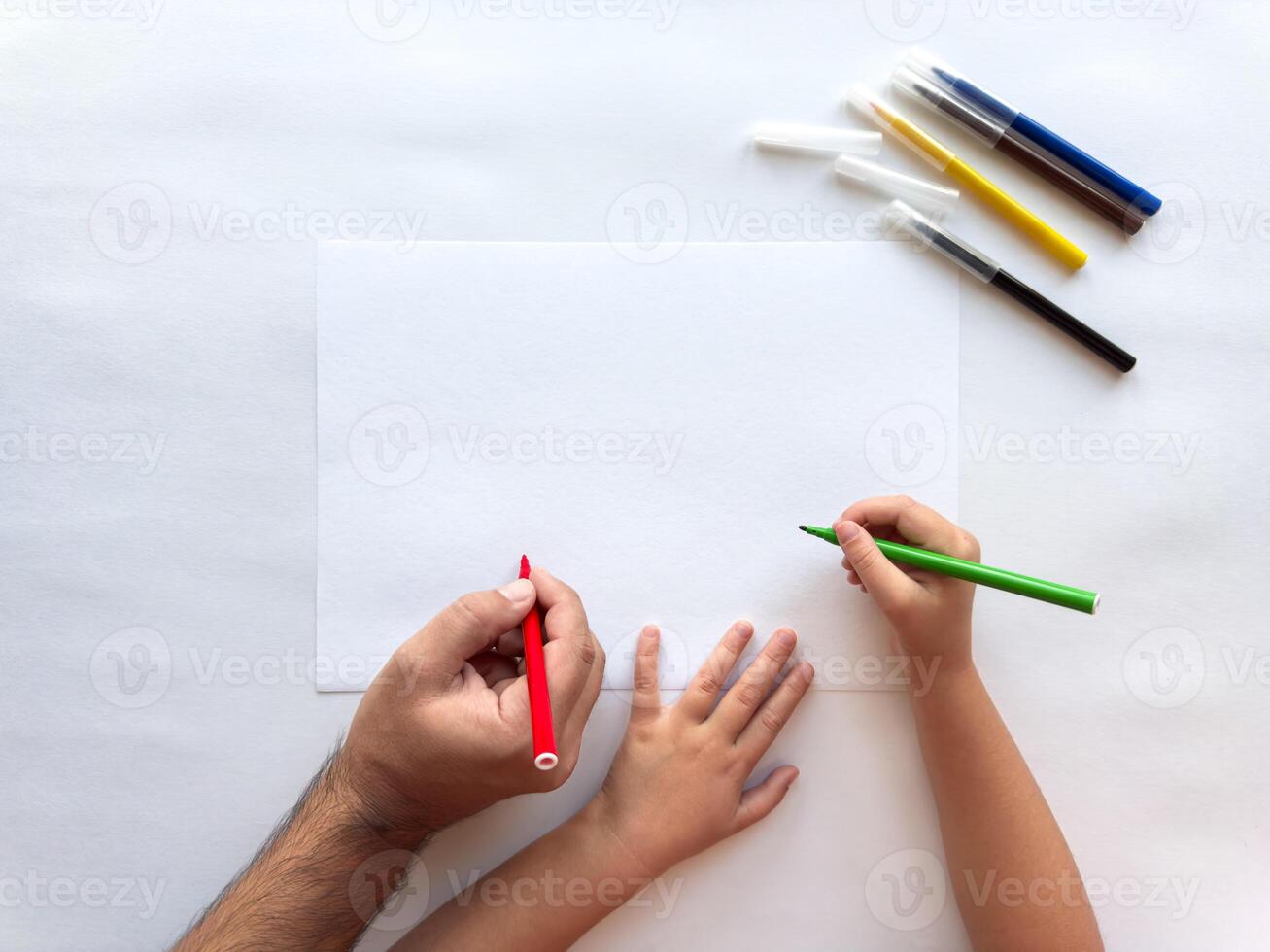 Artistic bonding. Parent and child drawing creative expressions together photo