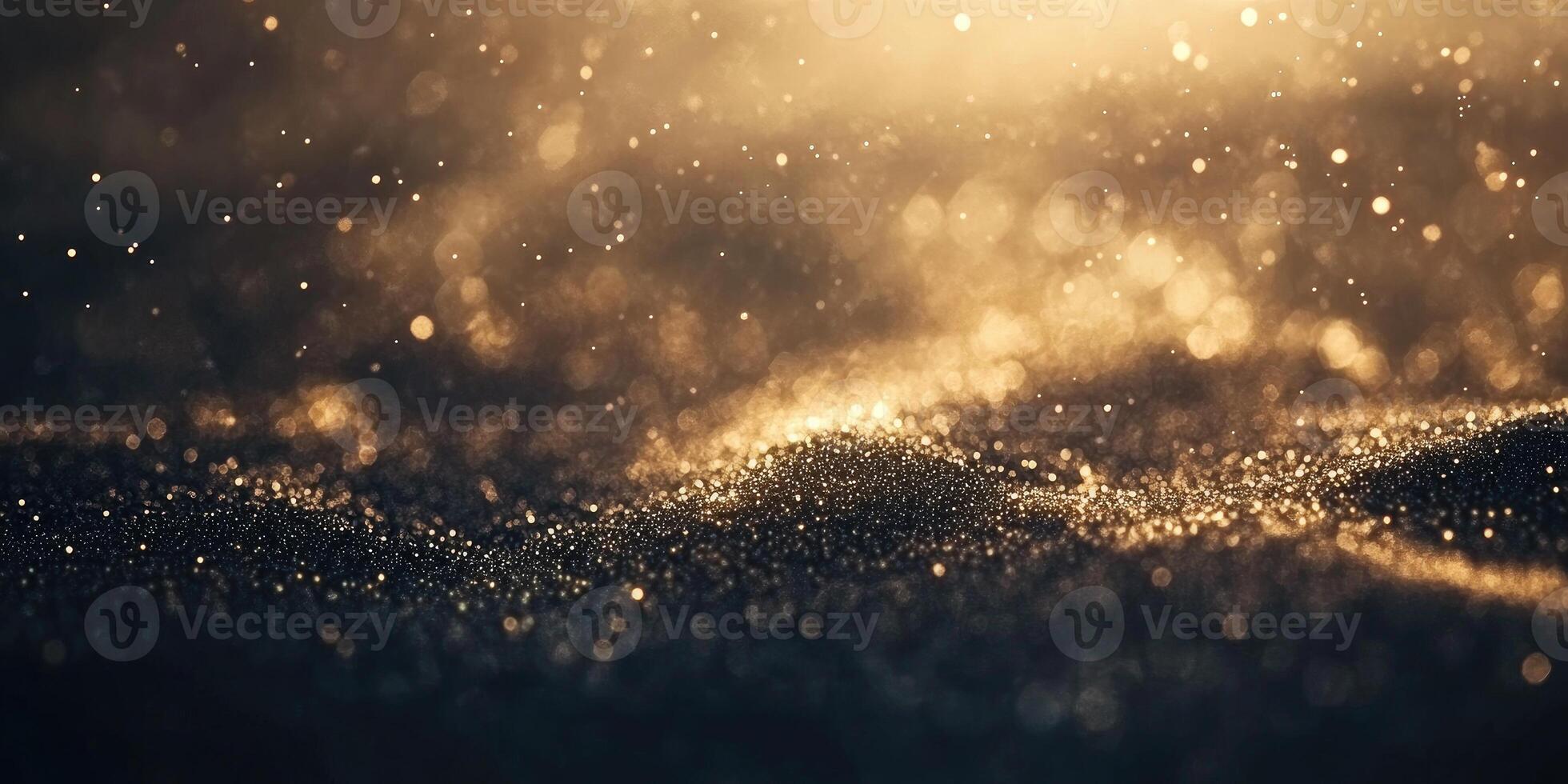 Glittering golden sparkles on dark matte background for elegant design and decoration photo