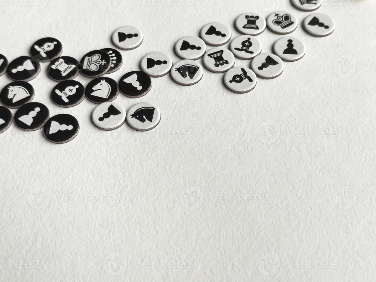Arrangement of minimalist chess pieces on white background for strategic gameplay concepts photo