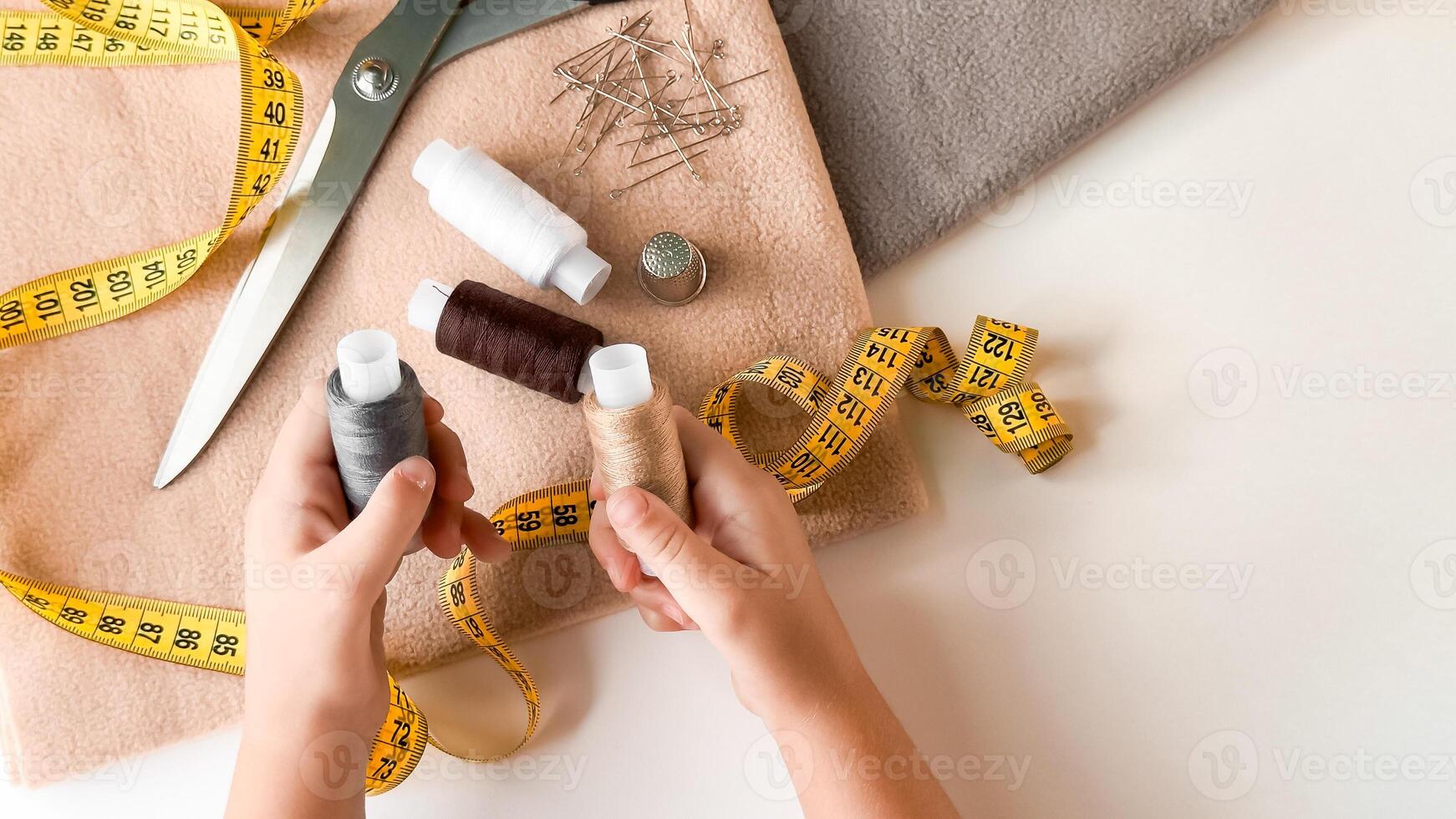 Creative sewing essentials. Threads, needles, and tools for tailoring photo