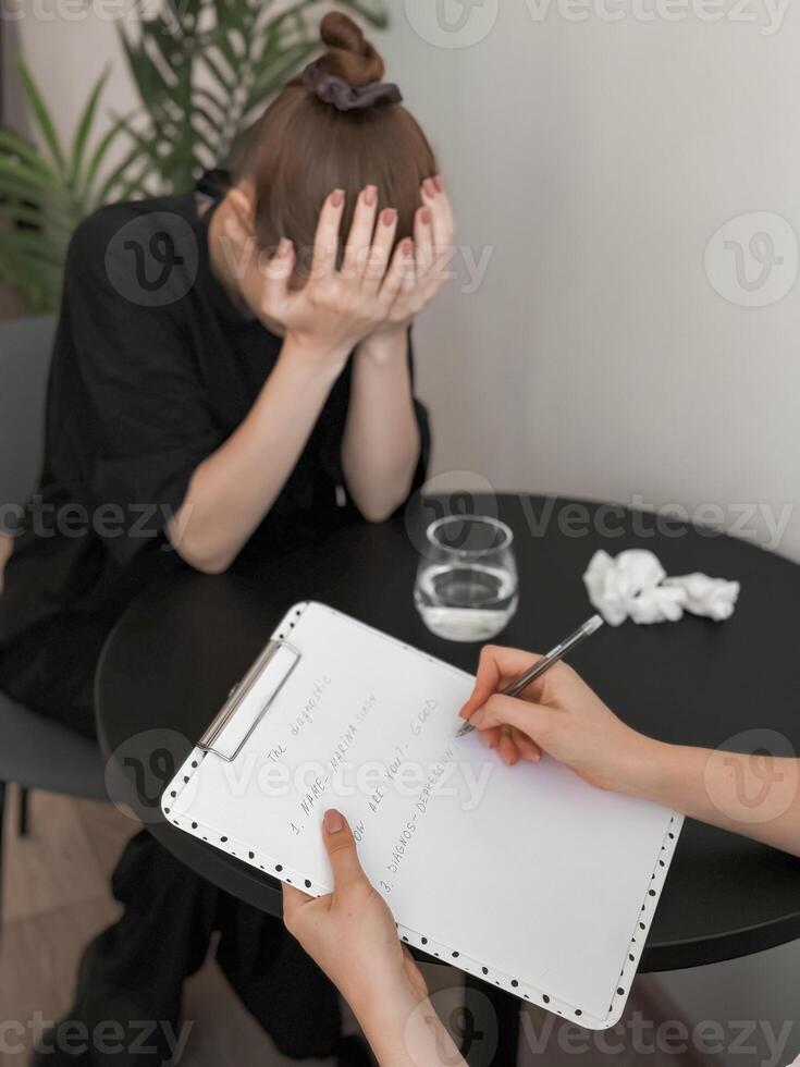 Emotional support counseling session with therapist and distressed client photo
