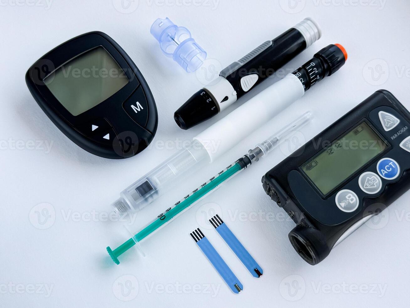 Essential diabetic medical tools. Glucometer, insulin pen, pump, and test strips photo