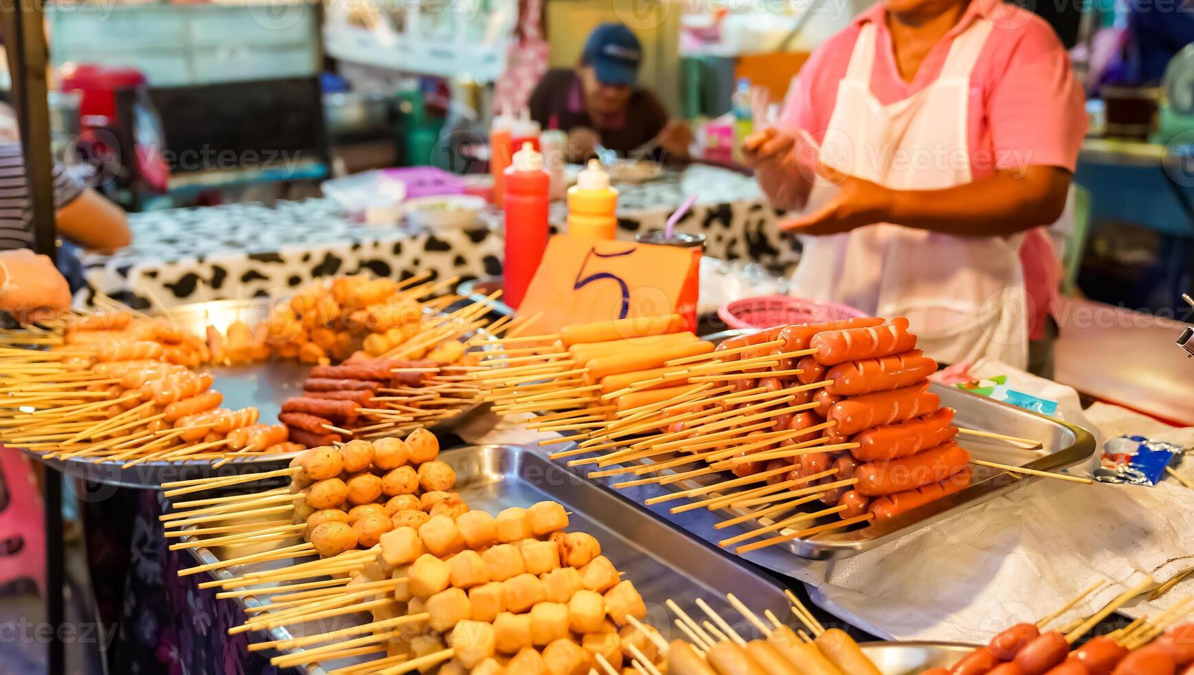 Food Street meatball and sausage skewer vendors At the flea market, arrange them on trays. photo