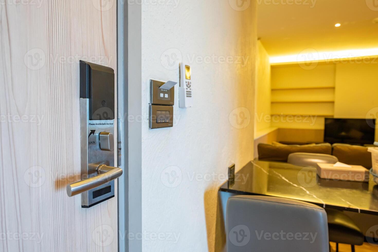 The room has a digital on off system. Electronic door handle with key card to lock and unlock door, access control keycard. Digital door lock security systems for access protection of hotel door. photo