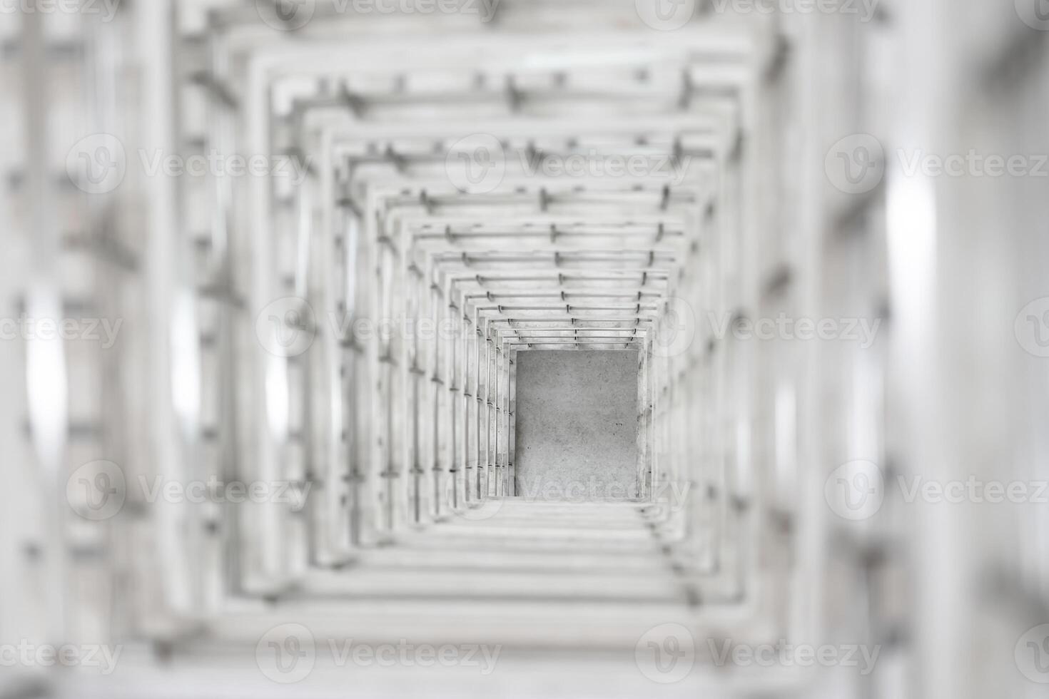 Top angle view of the white reinforced steel bar framework column construction in the work site. photo