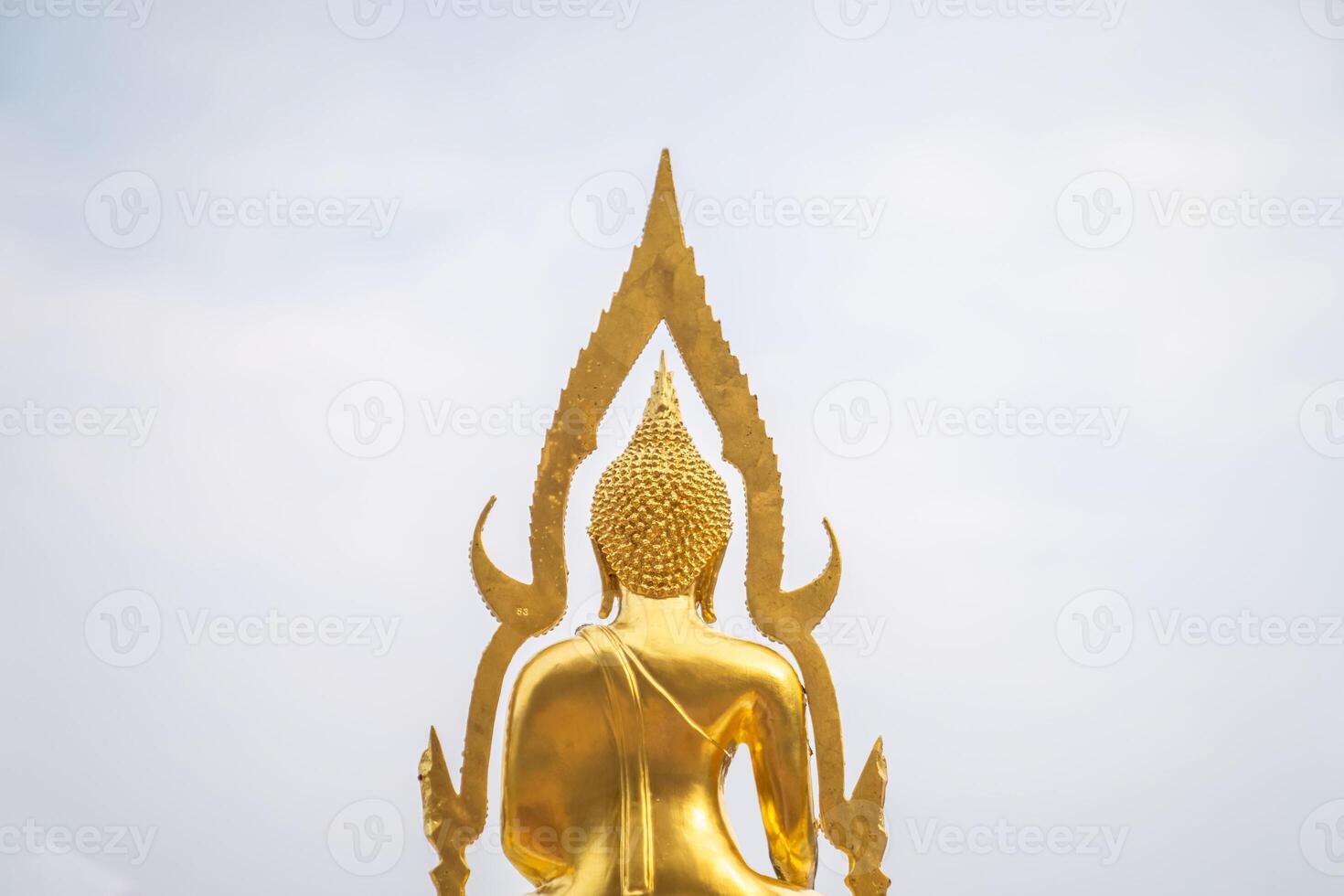 A stunning golden Buddha sculpture, exemplifying the deep reverence and devotion of Thai individuals in their spiritual worship. photo