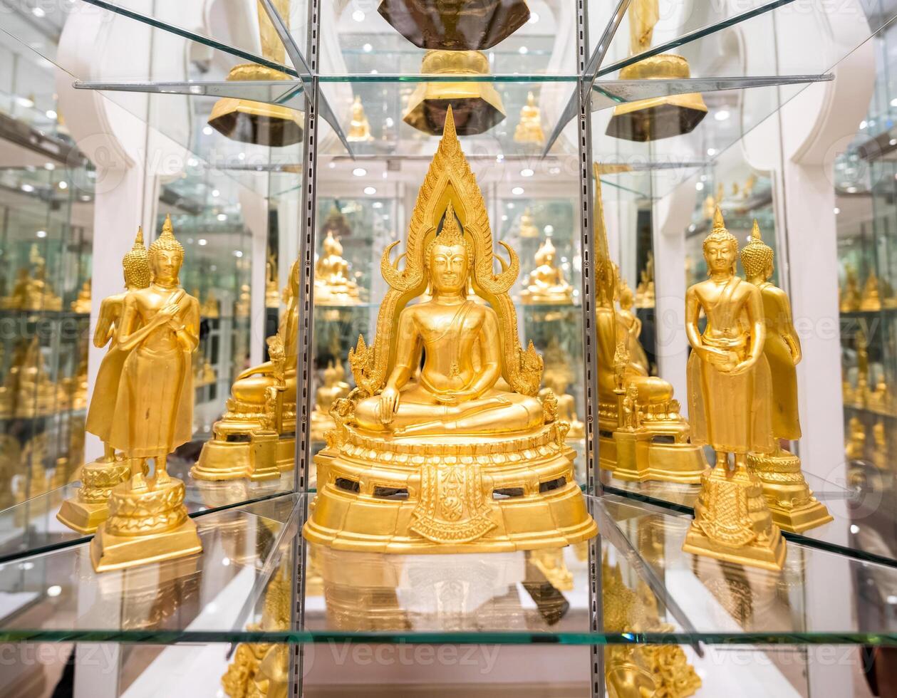 A stunning golden Buddha sculpture, exemplifying the deep reverence and devotion of Thai individuals in their spiritual worship. photo