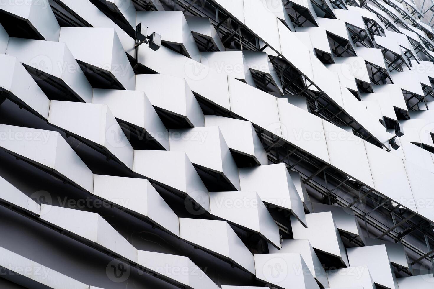 modern Aluminium composite material architecture gray color and Hexagon shape popup texture on exterior facade building. photo