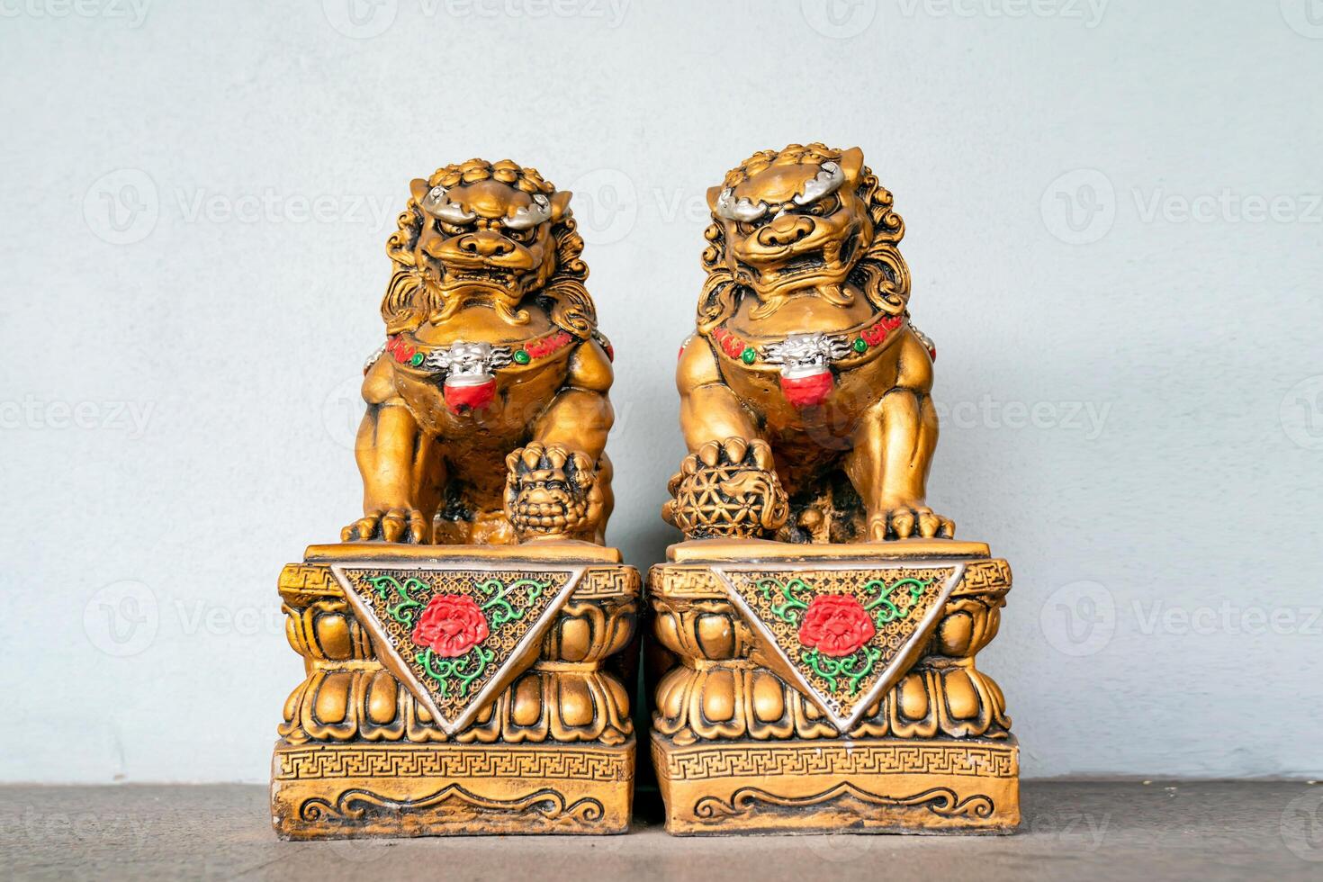Chinese golden god lion statue is the Asia zen structure ornament emperor in front of the door to protect the bad thing come in. photo