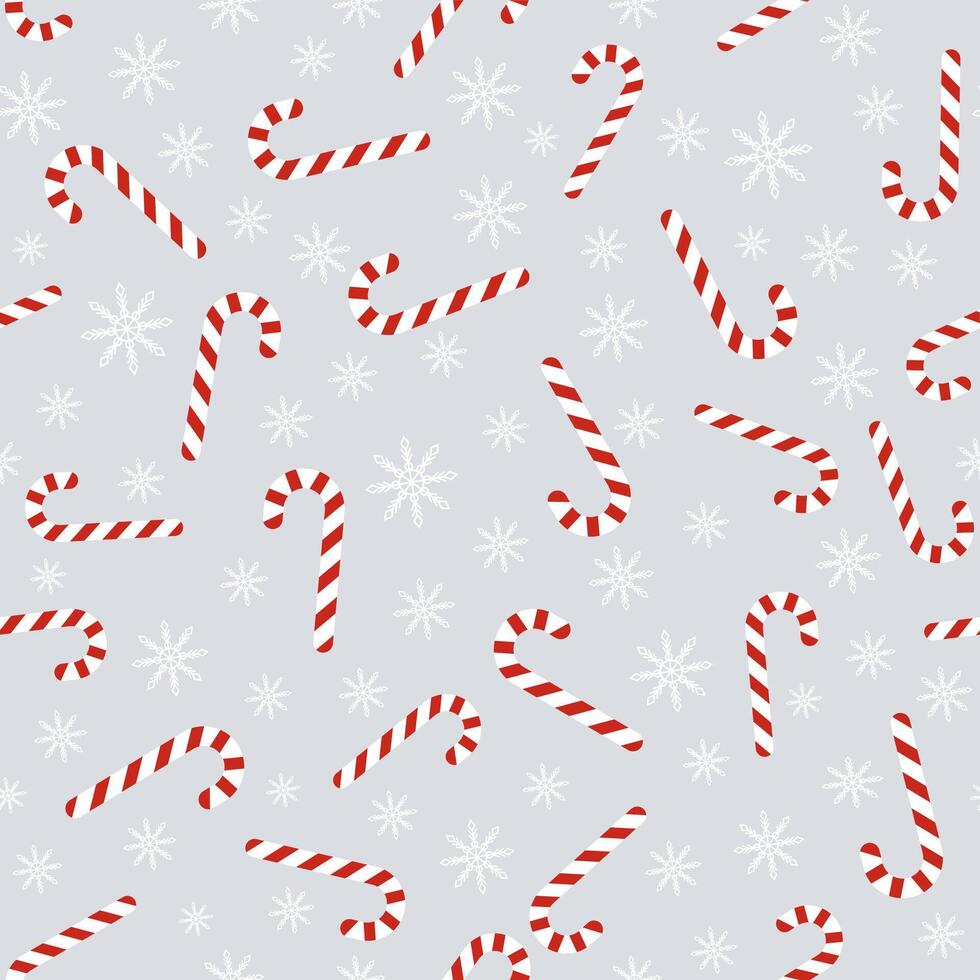 Christmas seamless pattern with candy canes and snowflakes vector