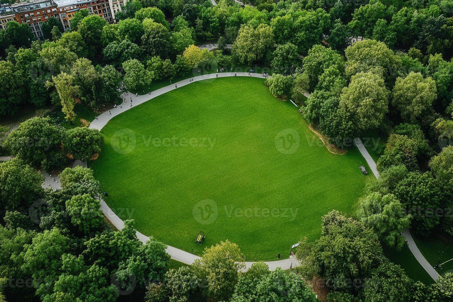 Aerial view of a lush green park with walking paths. photo