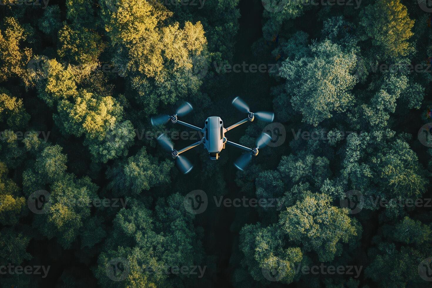 Drone flying over lush green forest canopy. photo