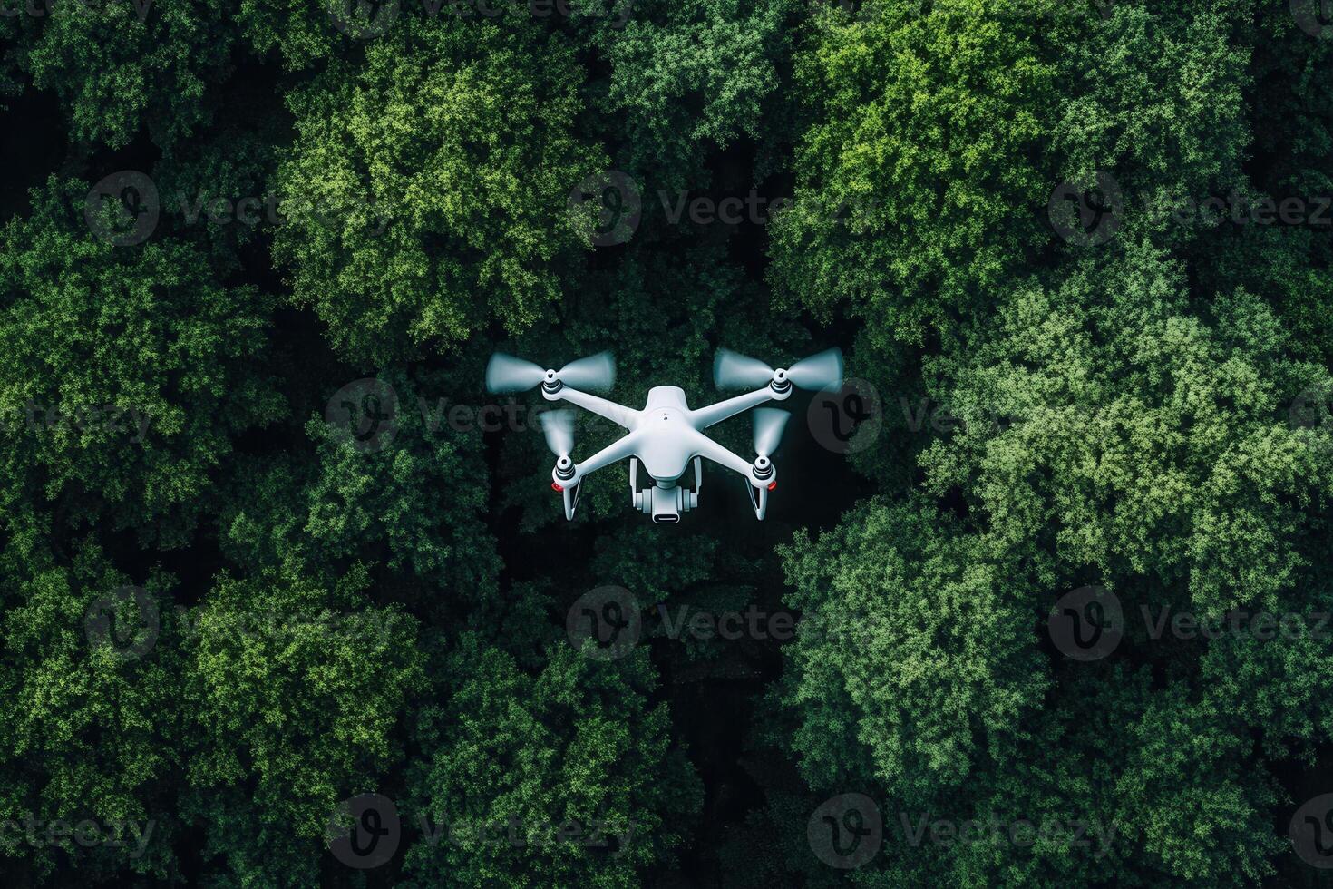 Aerial view of drone flying over lush green forest canopy. photo