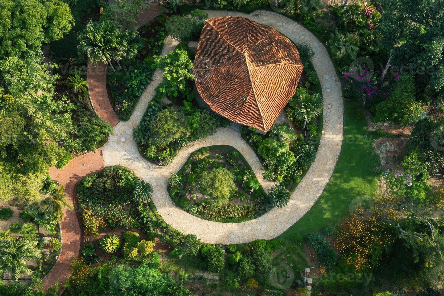 Aerial view of a tropical garden with a unique pavilion. photo