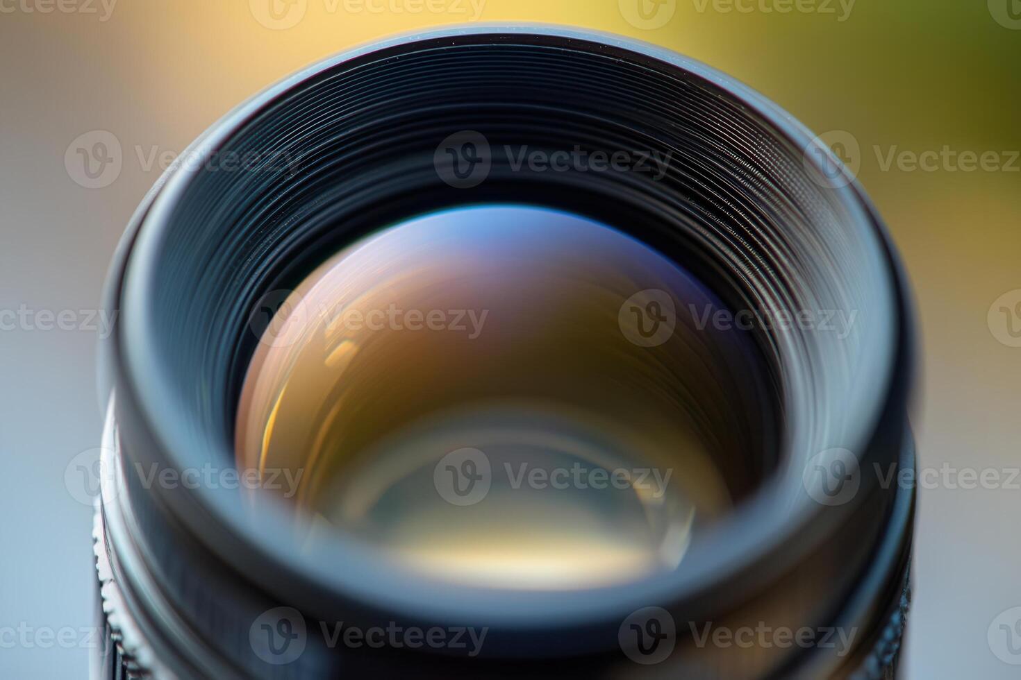 Close-up of a camera lens showing its intricate details and reflecting colors. photo