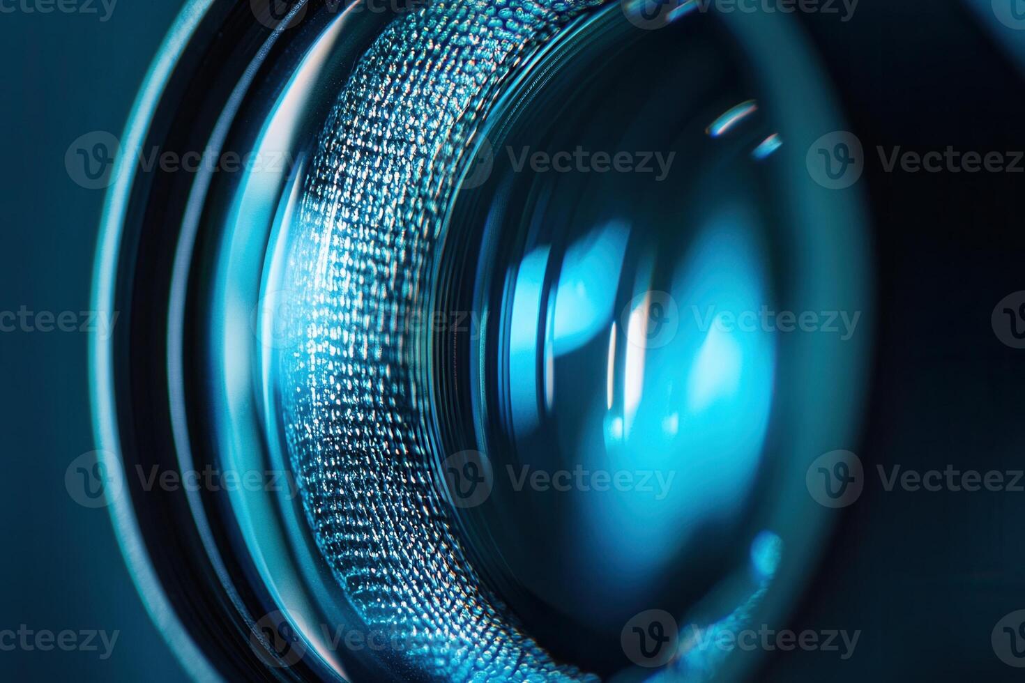 Close-up of a camera lens with blue light reflection. photo