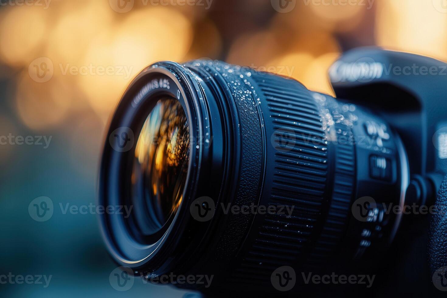 Close-up of DSLR camera lens with water droplets. photo