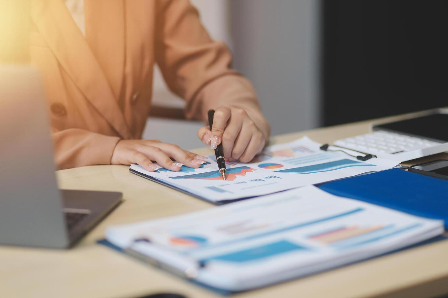 business documents businessman check legal document review Prepare documents or analysis reports, tax items, accounting documents, data contracts, office partner agreements. photo