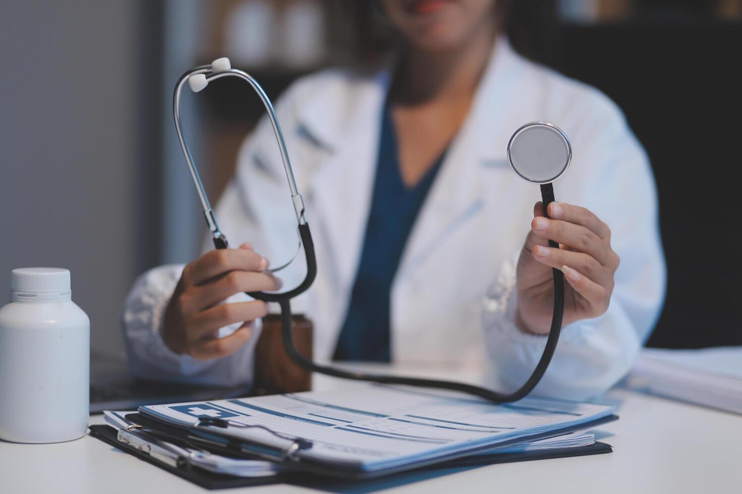 picture of doctor hand with stethoscope listening something photo