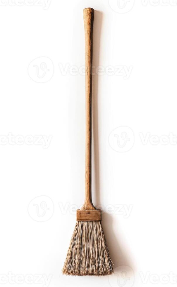broom isolated on white background photo