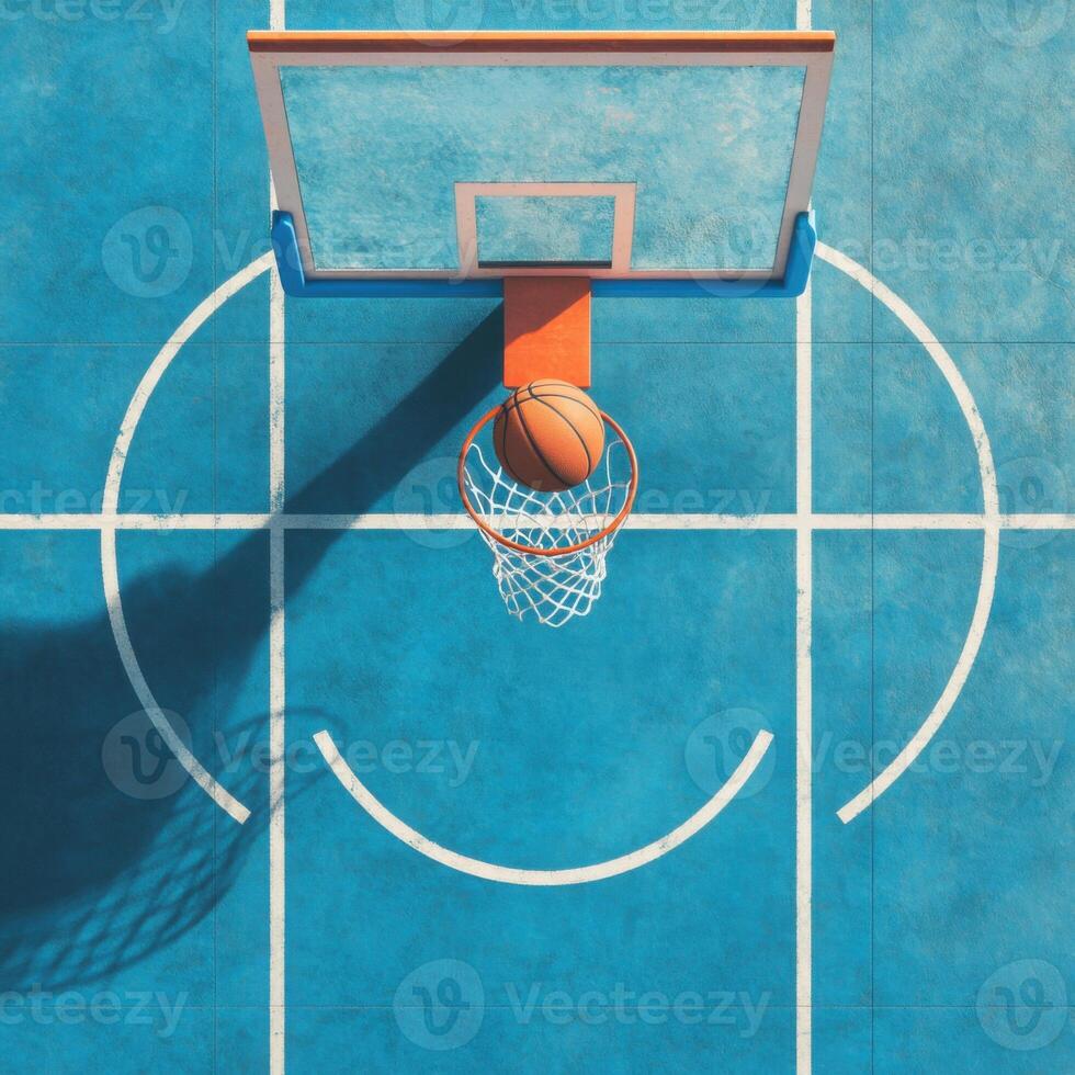 shot of a basketball court, with a basketball flying towards a perfectly aligned hoop photo