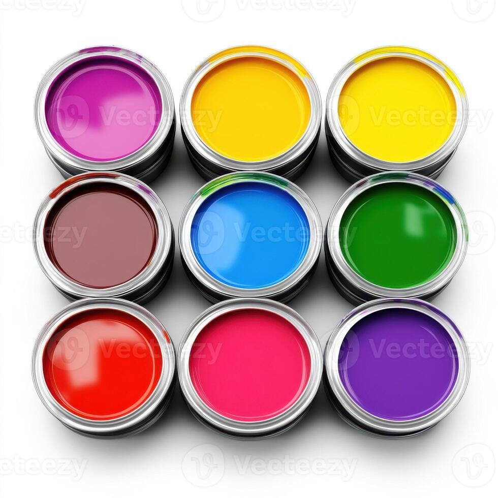 Canisters with colorful paints isolated on white photo