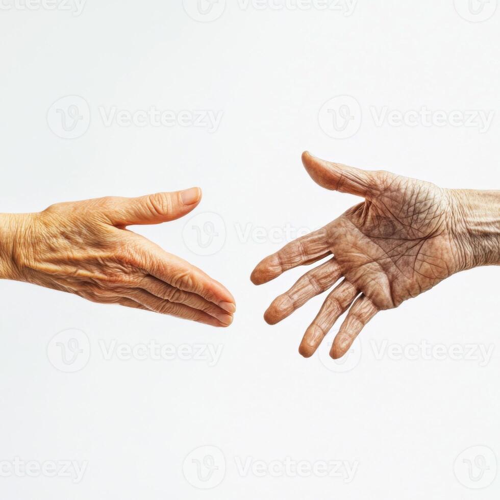 handshake between two elderly people. Symbolizes understanding between each other photo