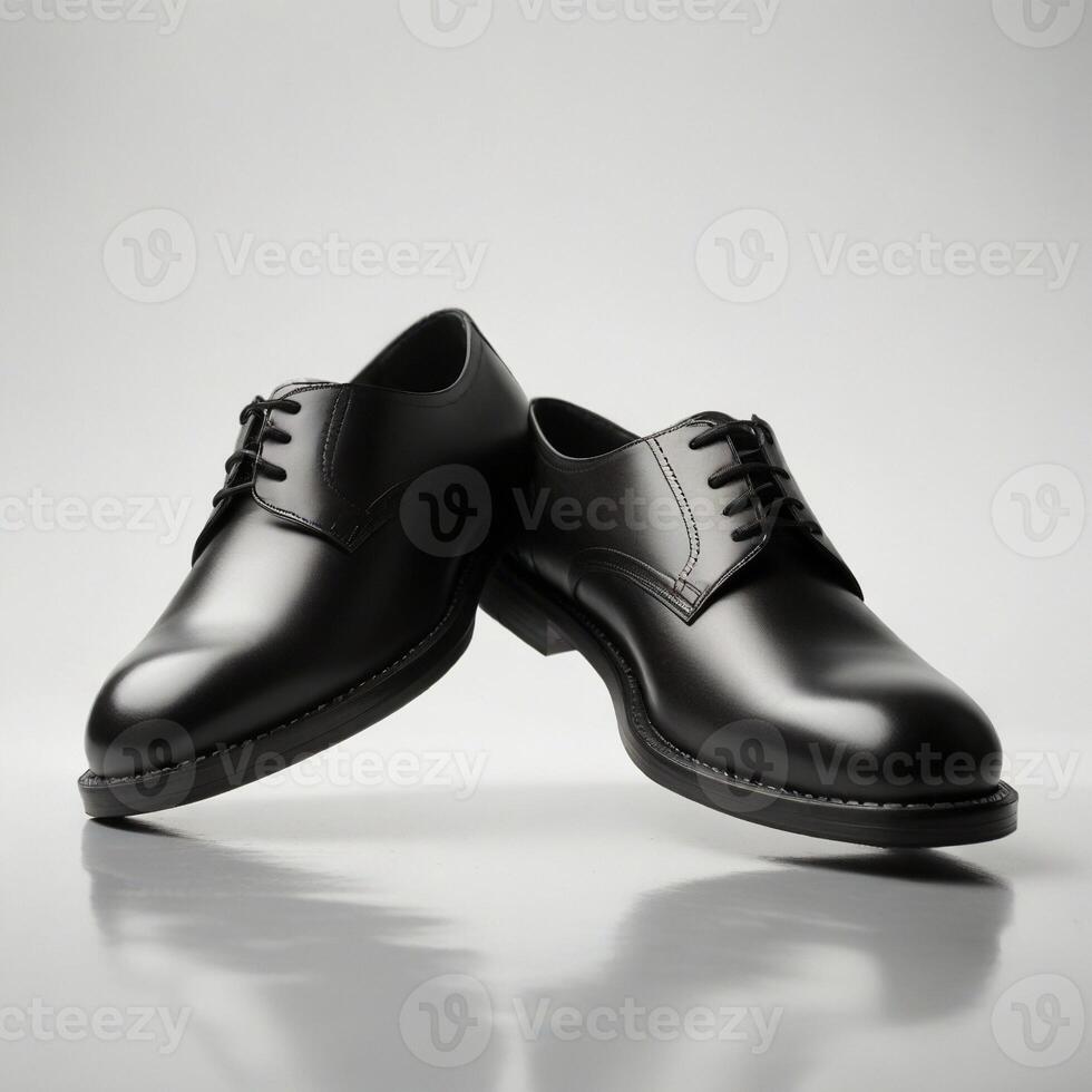 Elegant black dress shoes on white background photo