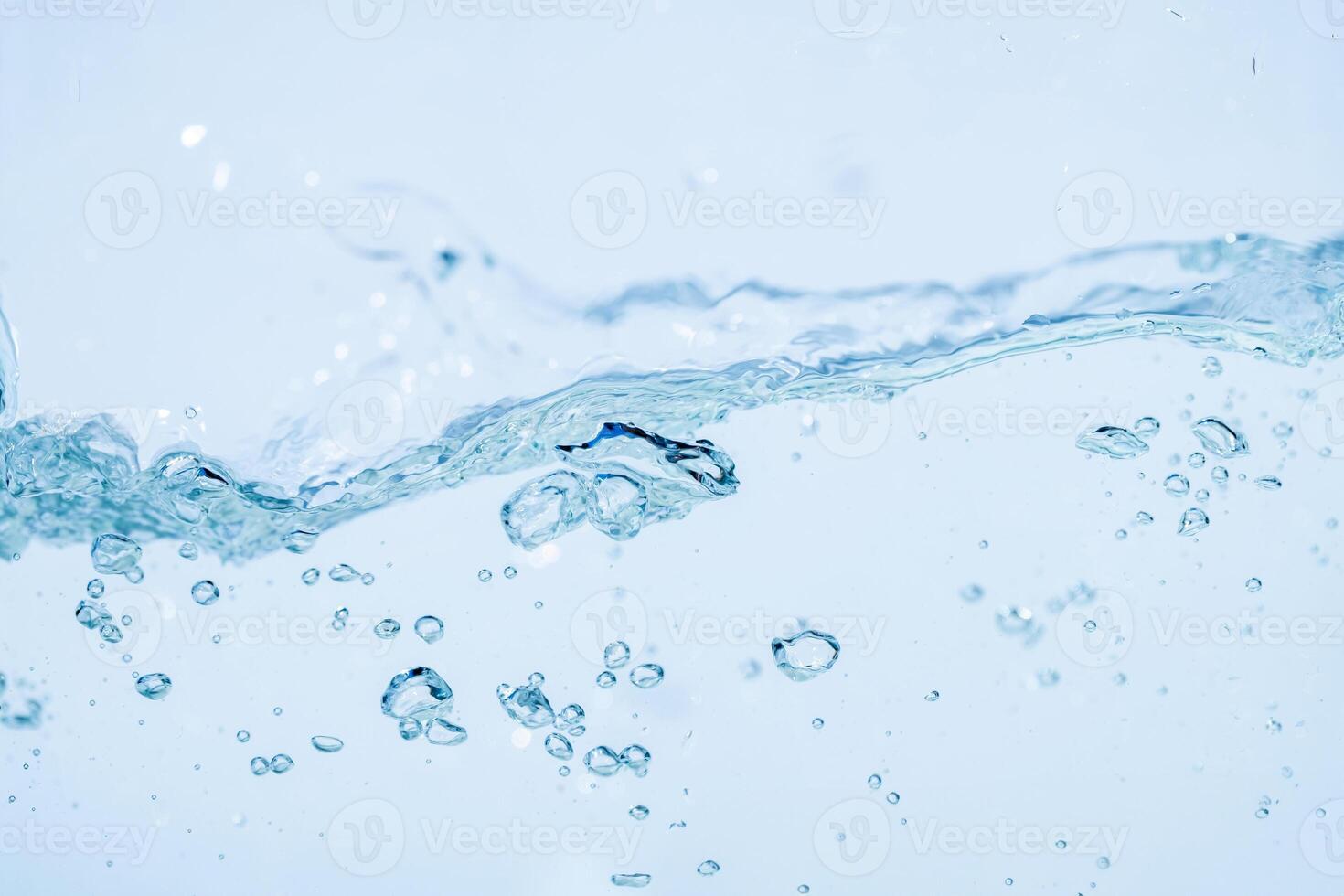 Water splash isolated on white background, Air Bubbles Float Up Under Blue Water. Pure Water Wave, Oxygen Relaxation. Blue bubbles Water Textured. photo