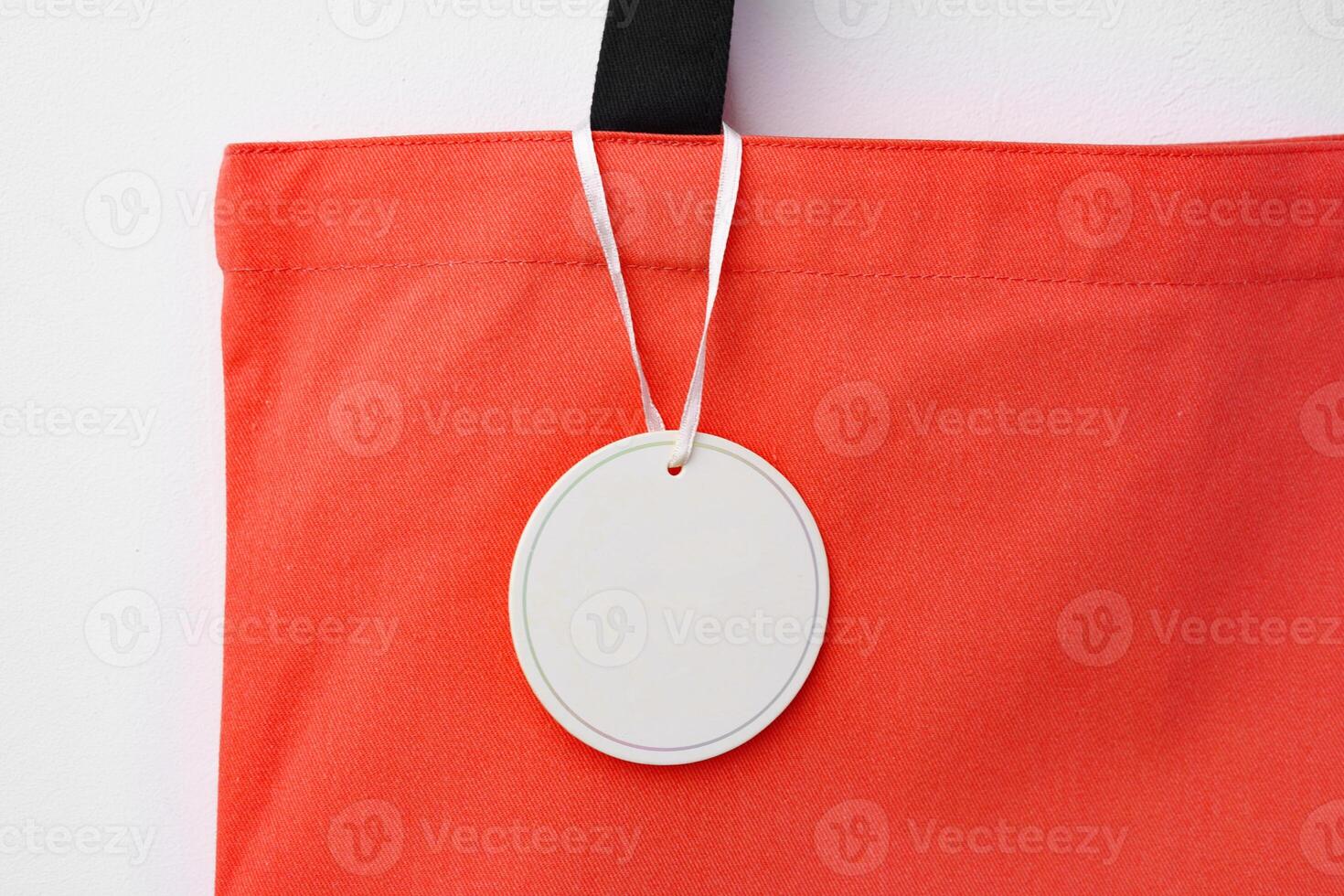 Eco bag for shopping with blank tag on white background photo