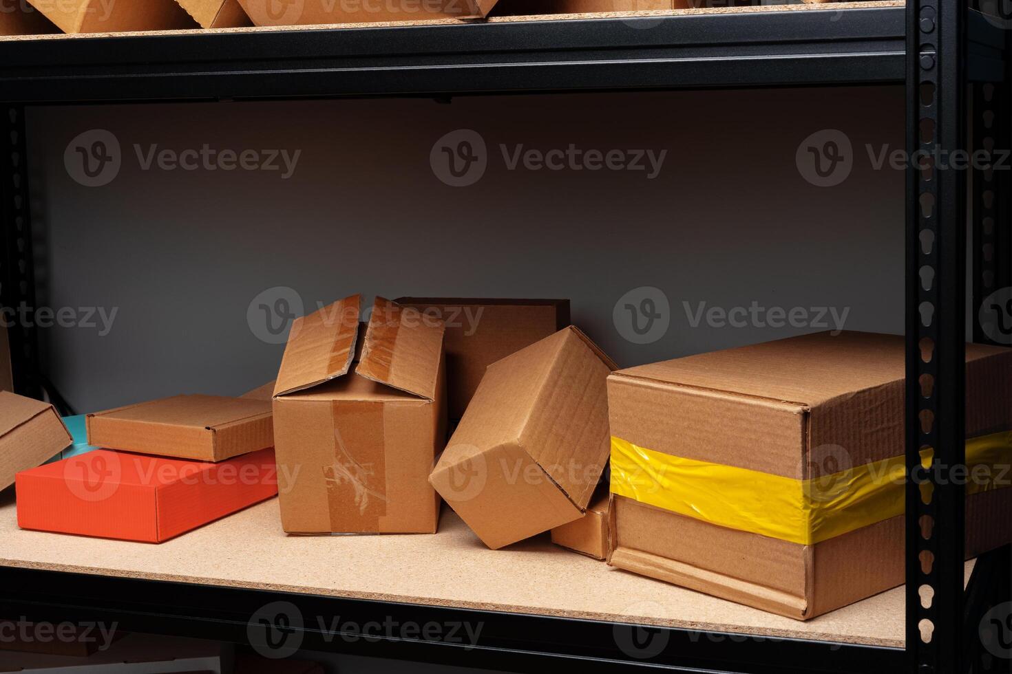 Rows of shelves with cardboard boxes in modern warehouse photo