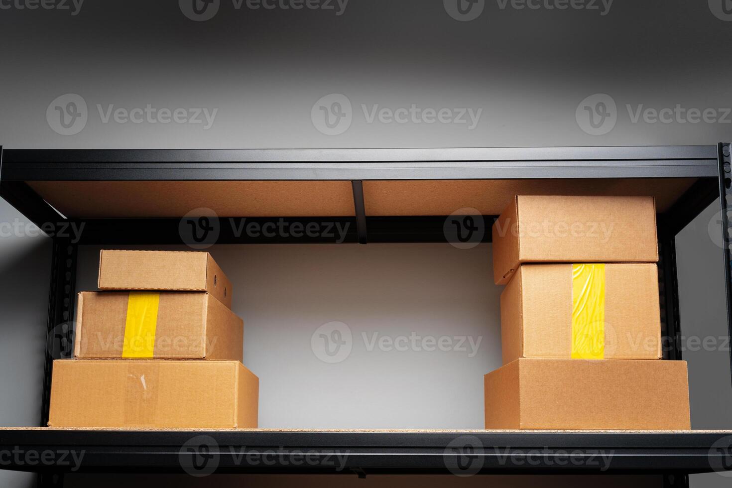 Rack shelves with paper boxes in warehouse. photo