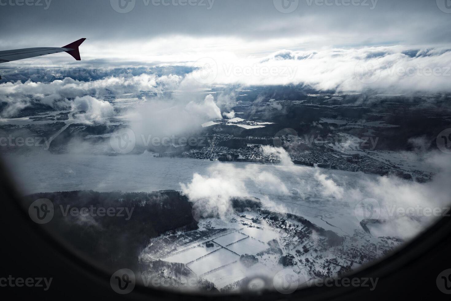 View through window of aircraft during flight photo