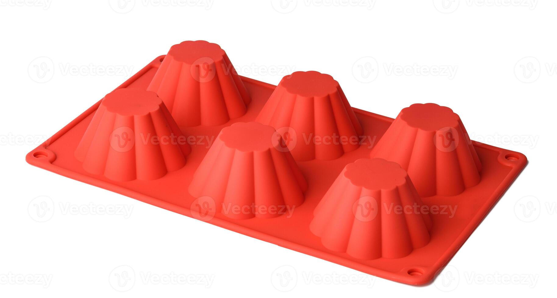 Silicone form for cupcake baking on white background photo