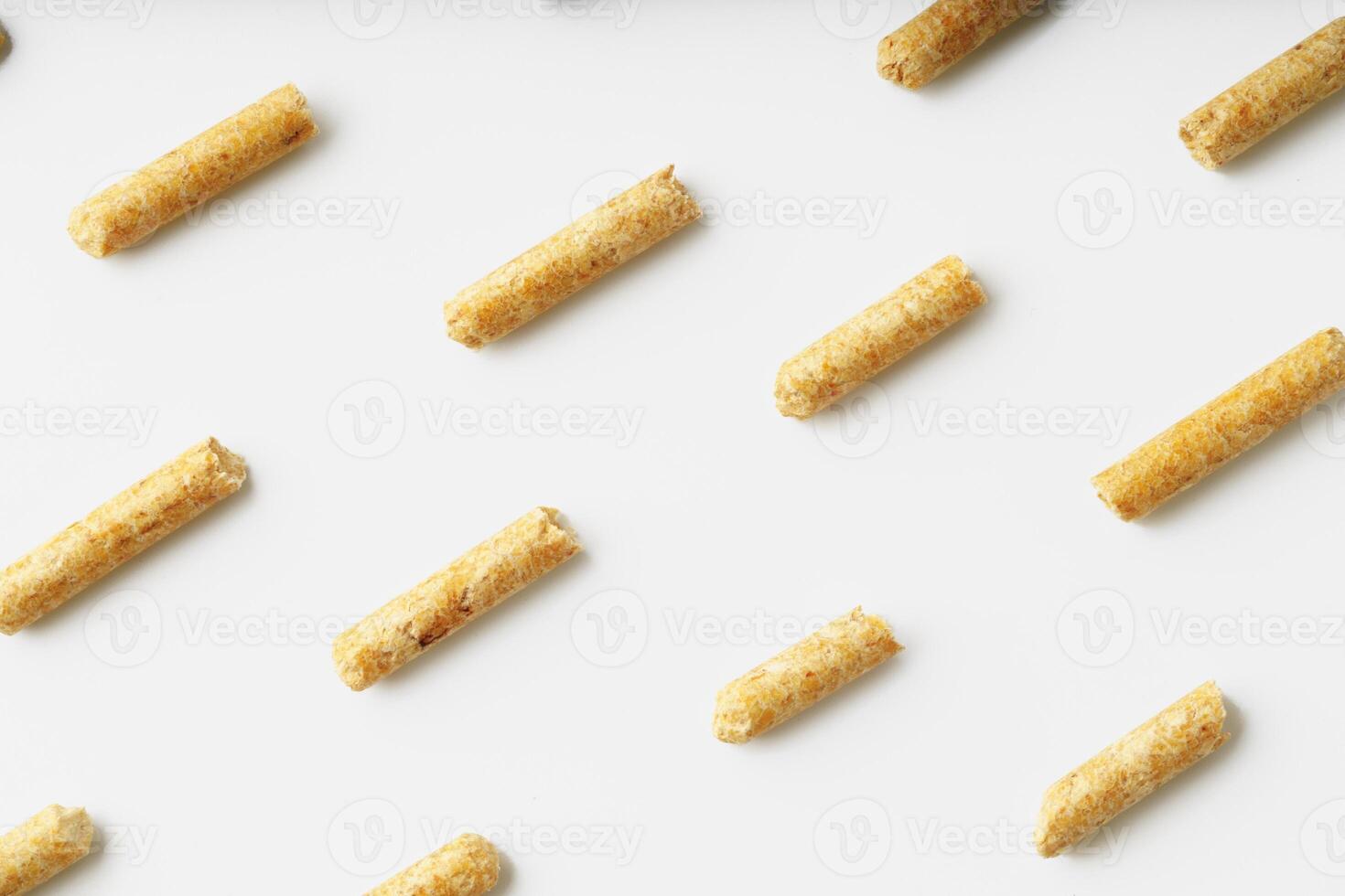 Wood pellets biofuel isolated on white background photo