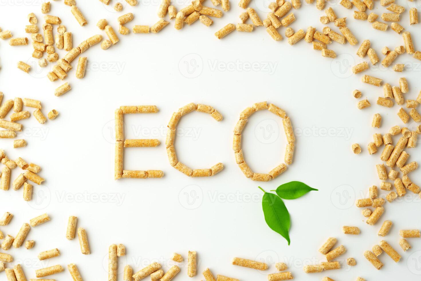 Wood pellets formed in word 'ECO' isolated on white background photo