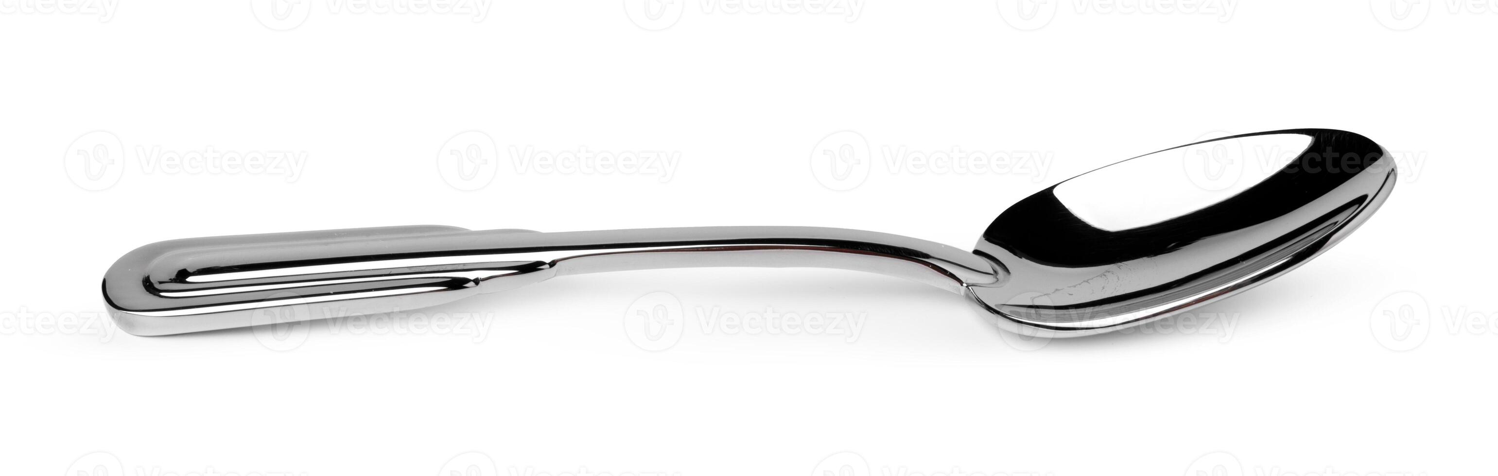 Metal steel spoon isolated on white background photo