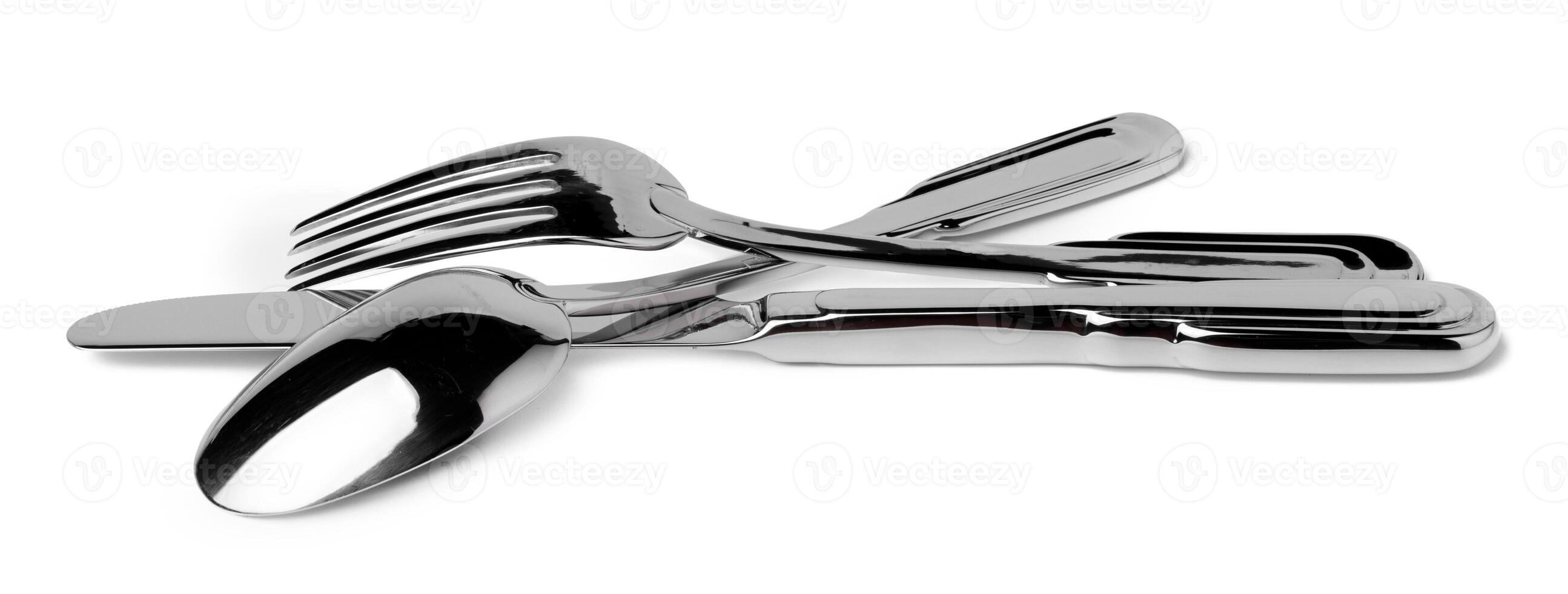 Set of new cutlery isolated on white background photo