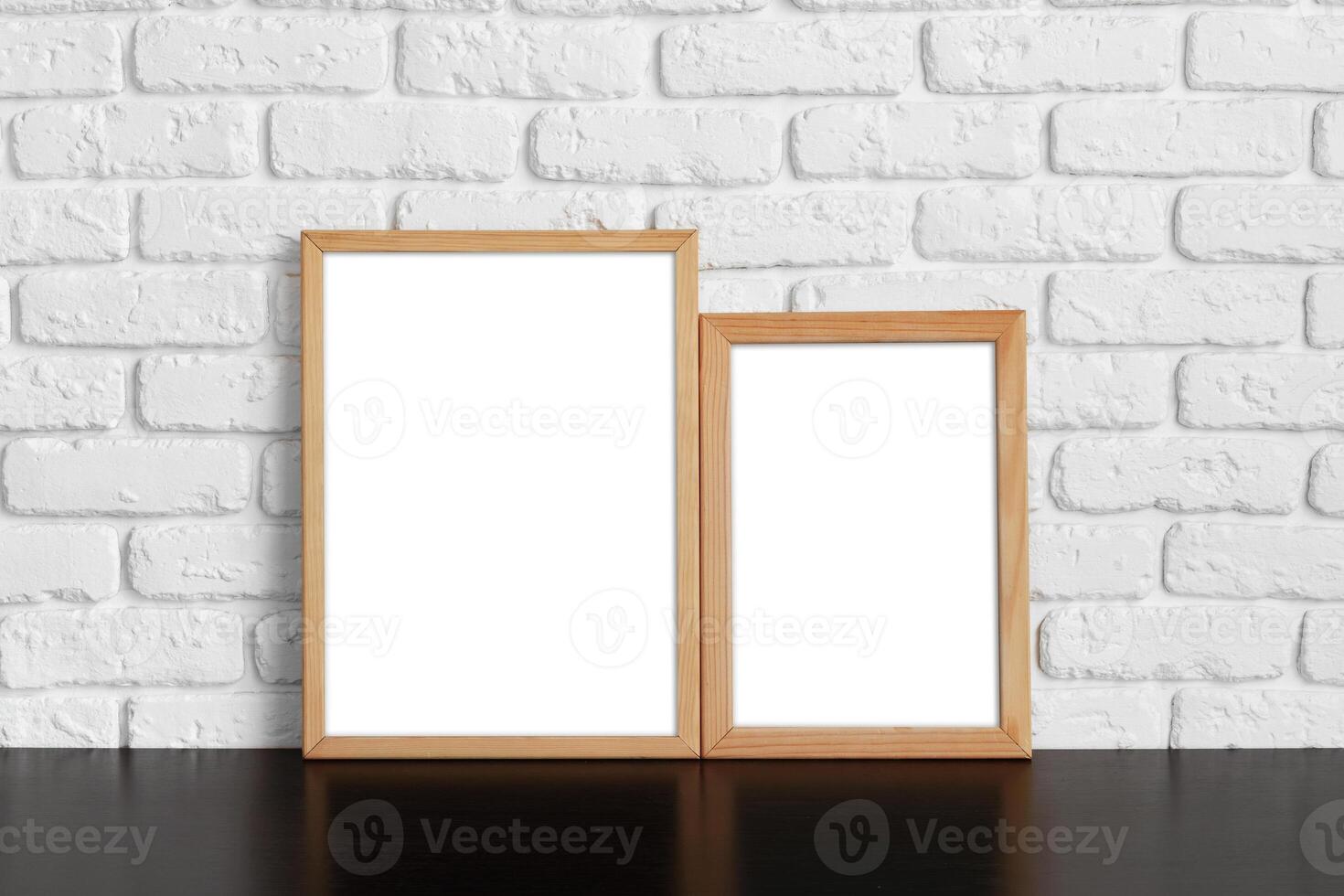 Blank picture frame against brick wall with copy space photo