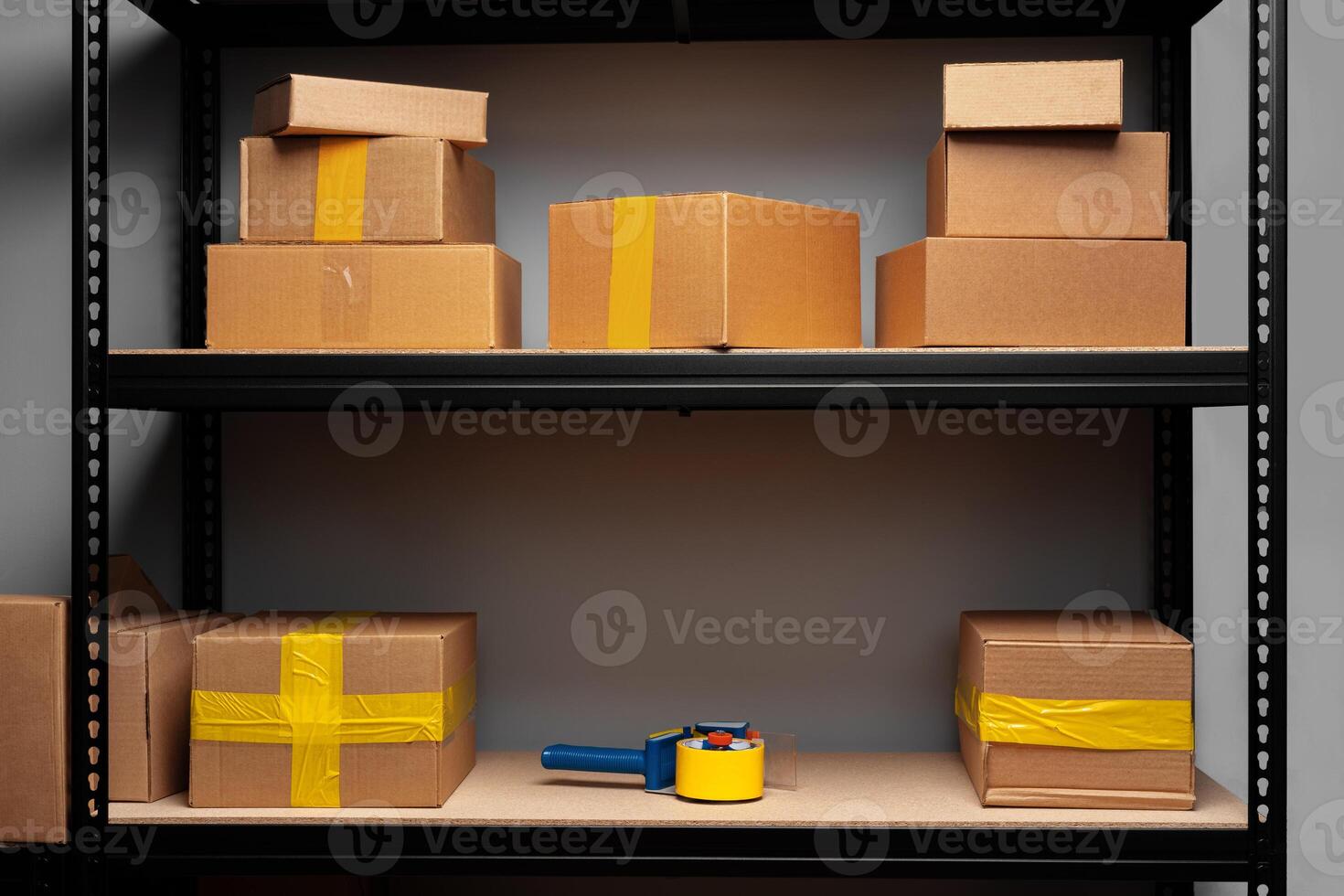 Rack shelves with paper boxes in warehouse. photo
