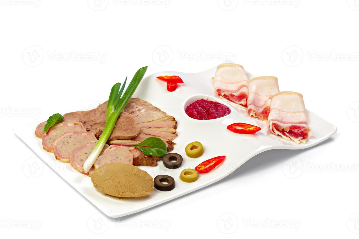 Sliced bacon lard on a plate isolated on white photo