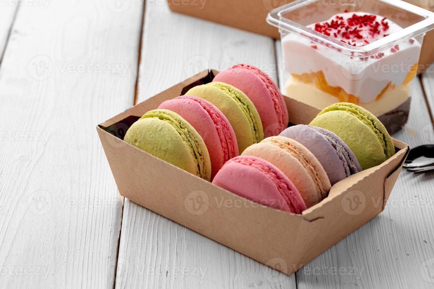 Colorful macaron cookies in a cardboard box photo