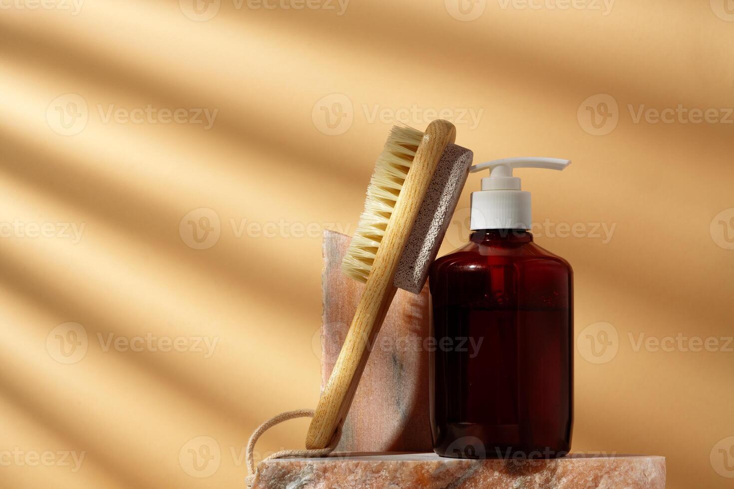 Cosmetic package dispenser with granite stone studio shot photo