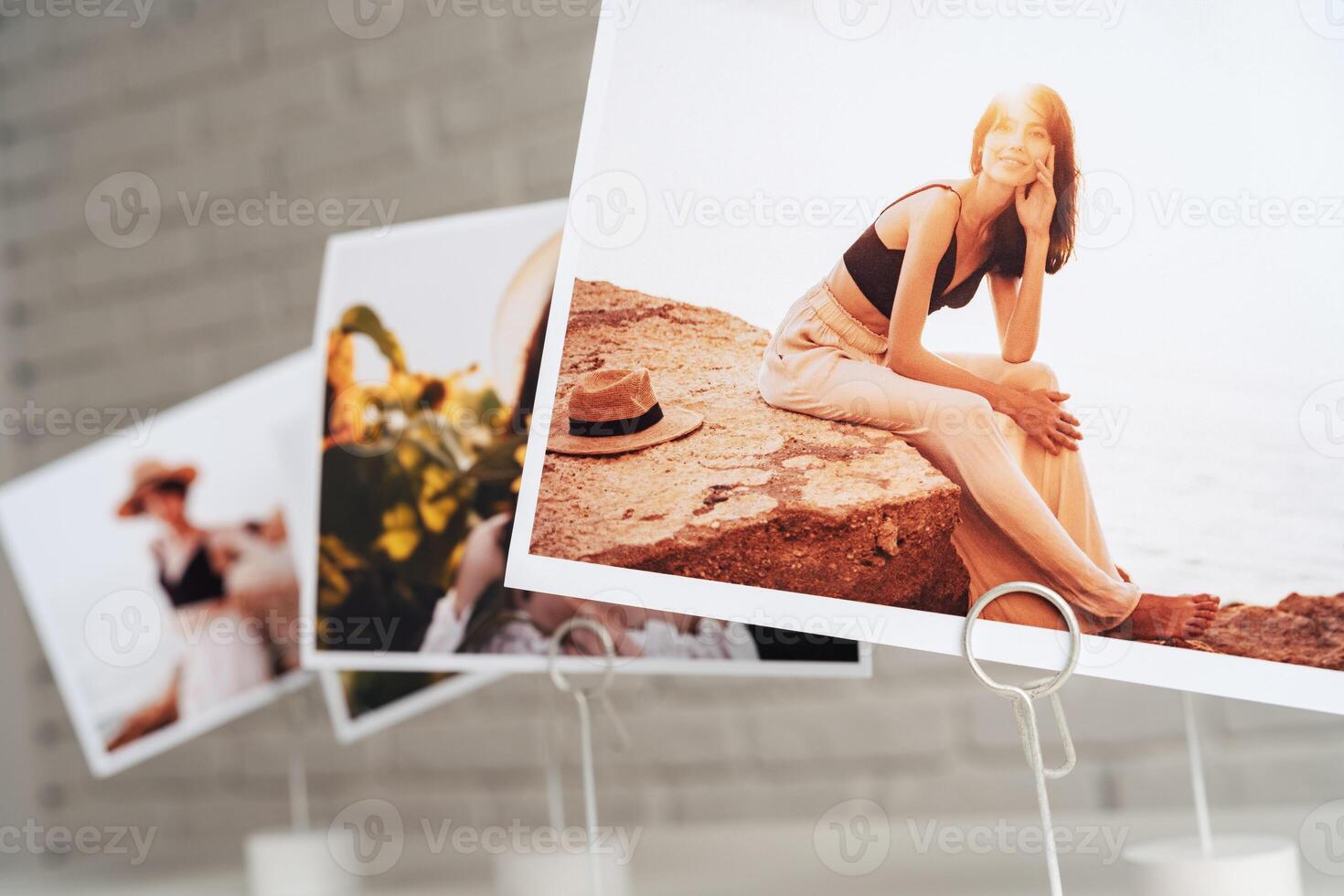 Printed colorful photos of women portraits. Printing photos concept