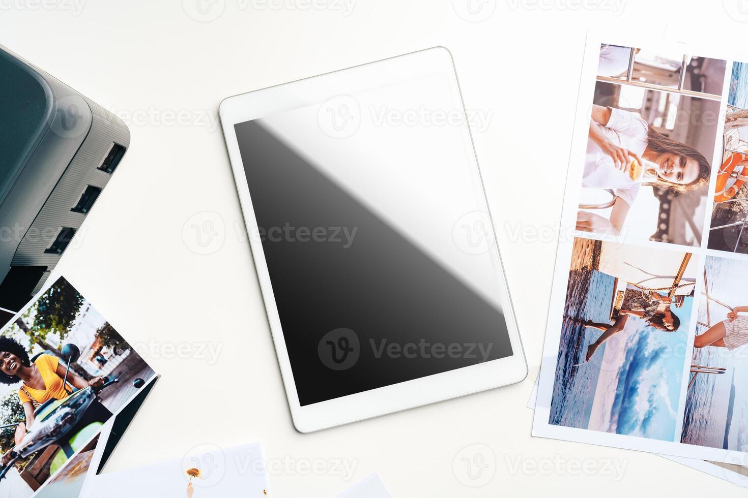 Printer and digital tablet on table. Printing photos concept