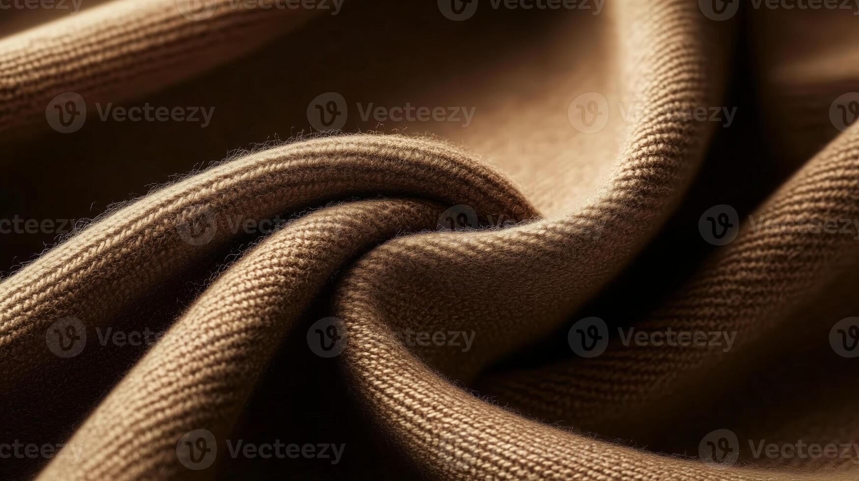 Soft brown fabric displays an elegant texture, inviting touch and showcasing high-quality textile craftsmanship during daylight photo